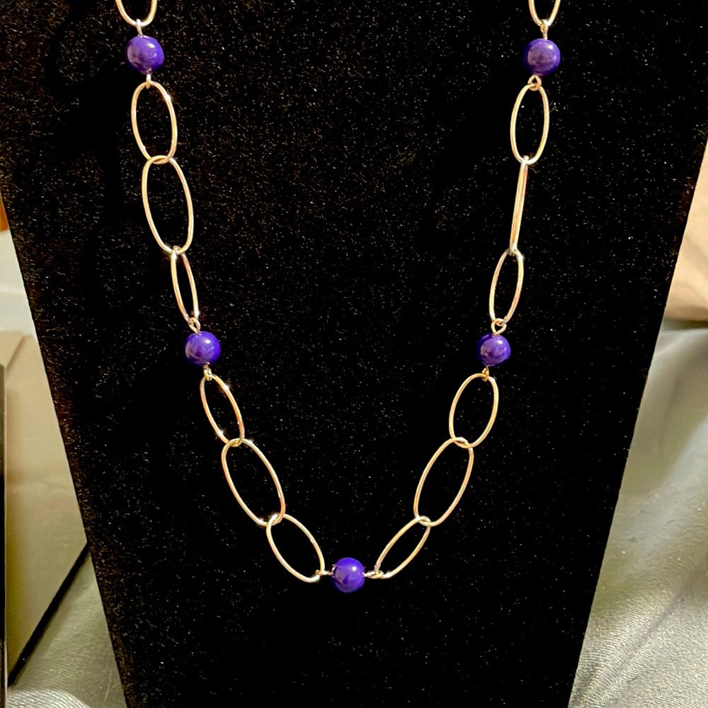 Long silver chain with blue beading